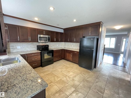 9412 156 Street, Edmonton, AB - Indoor Photo Showing Kitchen With Double Sink