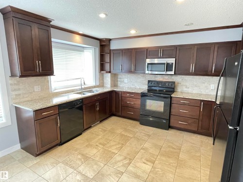 9412 156 Street, Edmonton, AB - Indoor Photo Showing Kitchen With Double Sink