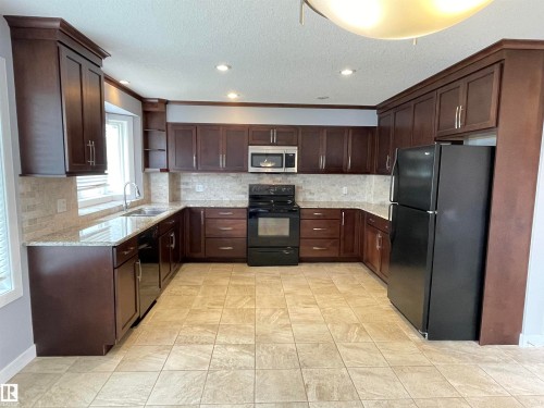 9412 156 Street, Edmonton, AB - Indoor Photo Showing Kitchen With Double Sink