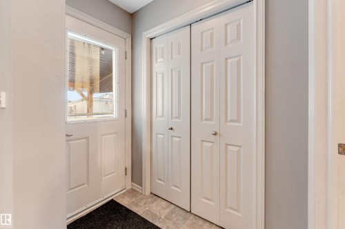 Entryway featuring tile patterned flooring - 1157 37 Avenue, Edmonton, AB - Indoor Photo Showing Other Room
