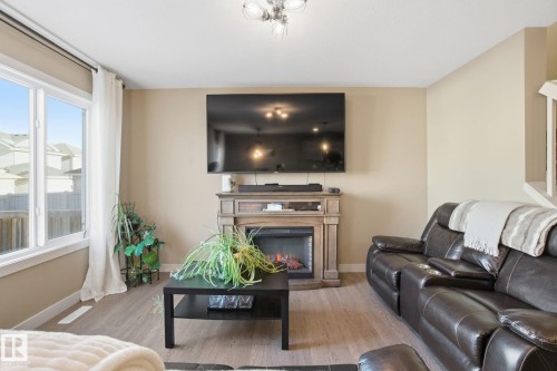 2614 Blue Jay Close, Edmonton, AB - Indoor Photo Showing Living Room With Fireplace