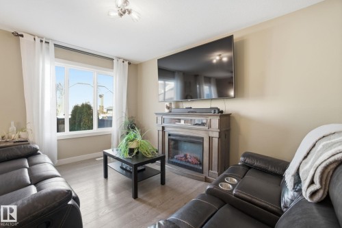 2614 Blue Jay Close, Edmonton, AB - Indoor Photo Showing Living Room With Fireplace