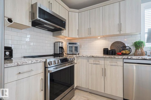 12209 103 Street, Edmonton, AB - Indoor Photo Showing Kitchen With Stainless Steel Kitchen With Upgraded Kitchen