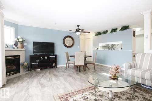 308 17150 94A Avenue, Edmonton, AB - Indoor Photo Showing Living Room With Fireplace