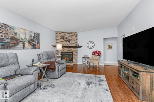 13016 79 Street, Edmonton, AB - Indoor Photo Showing Living Room With Fireplace