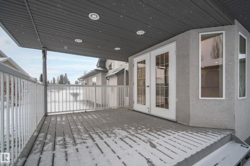Wooden terrace featuring french doors - 19 Country Lane, Stony Plain, AB - Outdoor With Deck Patio Veranda With Exterior