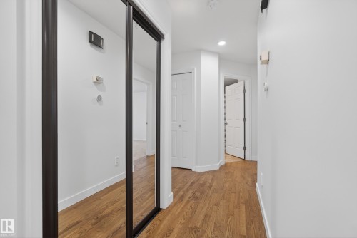 Hall with light wood finished floors and recessed lighting - 19 Country Lane, Stony Plain, AB - Indoor Photo Showing Other Room