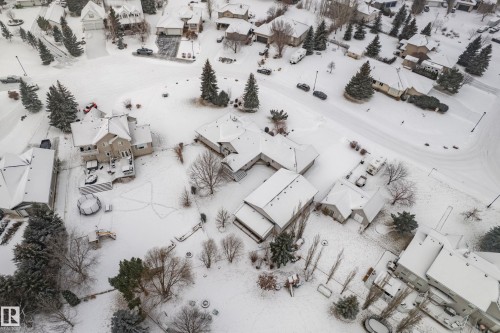 Snowy aerial view featuring a residential view - 19 Country Lane, Stony Plain, AB - Outdoor With View