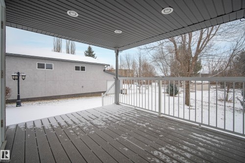 View of snow covered deck - 19 Country Lane, Stony Plain, AB - Outdoor With Deck Patio Veranda With Exterior