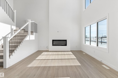943 18 Avenue, Edmonton, AB - Indoor Photo Showing Other Room With Fireplace
