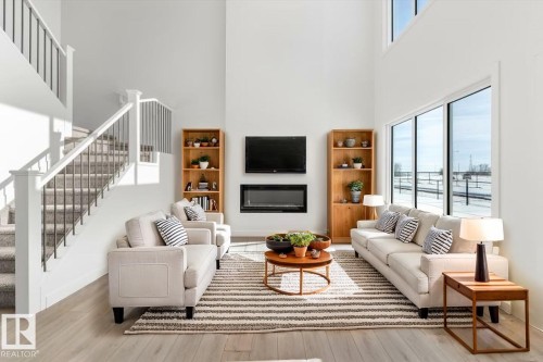 943 18 Avenue, Edmonton, AB - Indoor Photo Showing Living Room With Fireplace