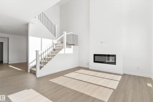 943 18 Avenue, Edmonton, AB - Indoor Photo Showing Living Room With Fireplace