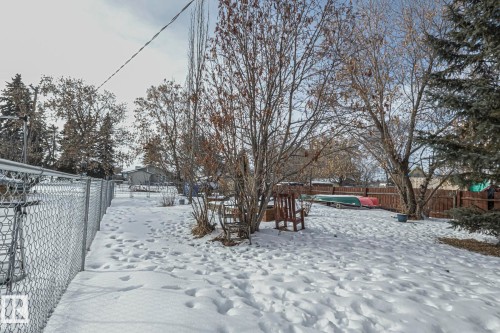 View of yard covered in snow - 4906 48 Street, Thorsby, AB - Outdoor