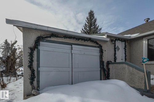 View of snow covered garage - 4906 48 Street, Thorsby, AB - Outdoor With Exterior
