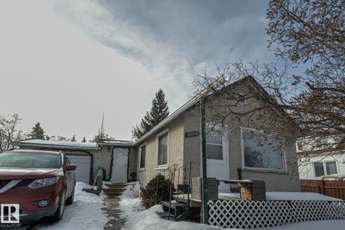 View of side of property with stucco siding - 4906 48 Street, Thorsby, AB - Outdoor