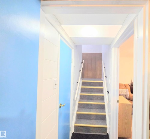 View of staircase - 80 Amberly Crest, Edmonton, AB - Indoor Photo Showing Other Room