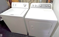 Laundry area with separate washer and dryer - 