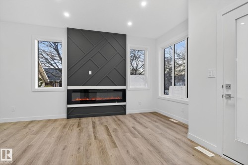 11927 90 Street, Edmonton, AB - Indoor Photo Showing Living Room With Fireplace