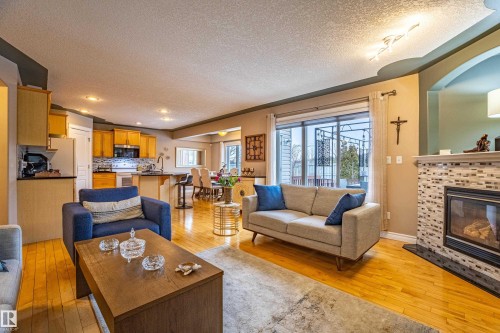 2721 Miles Place, Edmonton, AB - Indoor Photo Showing Living Room With Fireplace