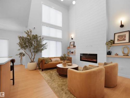 945 Elderberry Landing, Edmonton, AB - Indoor Photo Showing Living Room With Fireplace