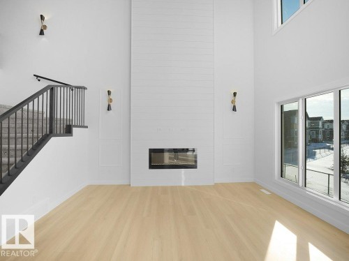 810 Elderberry Crest, Edmonton, AB - Indoor Photo Showing Other Room With Fireplace