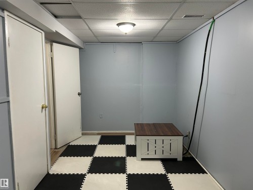 Mudroom featuring light flooring and a paneled ceiling - 17 9520 174 Street, Edmonton, AB - Indoor Photo Showing Other Room