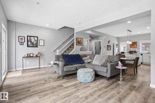 Living room featuring recessed lighting and light wood finished floors - 90 1010 Rabbit Hill Road, Edmonton, AB - Indoor Photo Showing Living Room