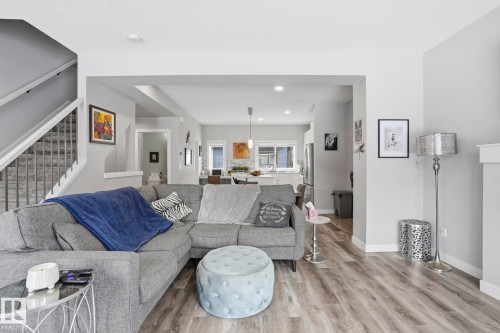 Living area with light wood-type flooring and recessed lighting - 90 1010 Rabbit Hill Road, Edmonton, AB - Indoor Photo Showing Living Room