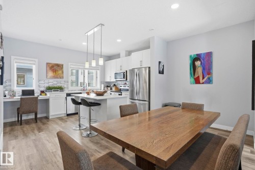 Dining area with light wood finished floors and recessed lighting - 90 1010 Rabbit Hill Road, Edmonton, AB - Indoor
