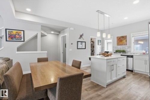 Dining space with light wood finished floors and recessed lighting - 90 1010 Rabbit Hill Road, Edmonton, AB - Indoor Photo Showing Dining Room