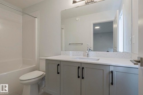 Full bath with vanity and tub / shower combination - 3520 Kulay Link Link, Edmonton, AB - Indoor Photo Showing Bathroom