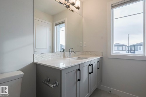 Bathroom featuring toilet and vanity - 3520 Kulay Link Link, Edmonton, AB - Indoor Photo Showing Bathroom