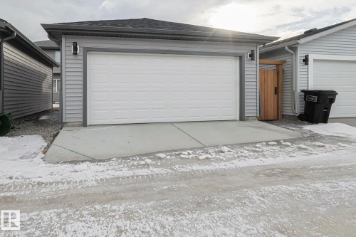 View of snow covered garage - 3520 Kulay Link Link, Edmonton, AB - Outdoor With Exterior