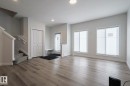 Entryway featuring dark wood-style floors and recessed lighting - 3520 Kulay Link Link, Edmonton, AB  - Indoor Photo Showing Other Room 