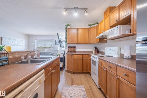15722 141 Street Nw, Edmonton, AB - Indoor Photo Showing Kitchen With Double Sink