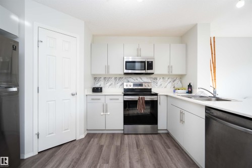 3099 Checknita Way, Edmonton, AB - Indoor Photo Showing Kitchen With Double Sink
