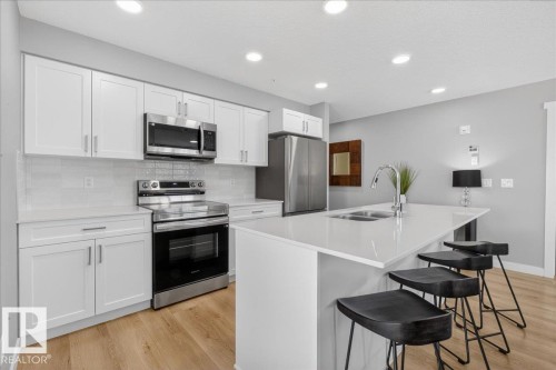125 1506 Tamarack Boulevard, Edmonton, AB - Indoor Photo Showing Kitchen With Double Sink With Upgraded Kitchen