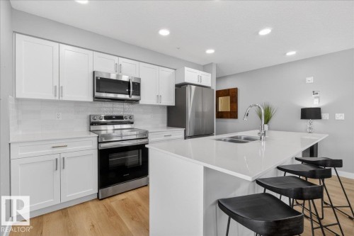 125 1506 Tamarack Boulevard, Edmonton, AB - Indoor Photo Showing Kitchen With Double Sink With Upgraded Kitchen