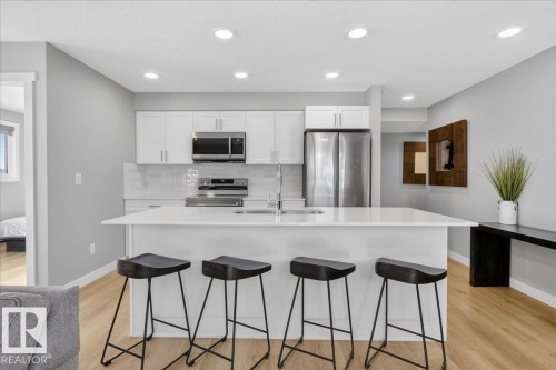 125 1506 Tamarack Boulevard, Edmonton, AB - Indoor Photo Showing Kitchen With Upgraded Kitchen