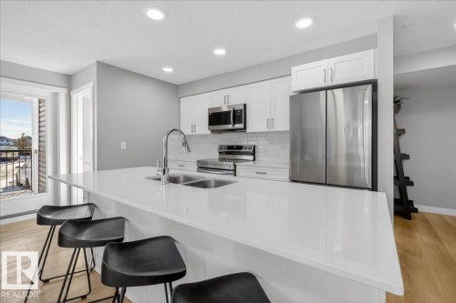 125 1506 Tamarack Boulevard, Edmonton, AB - Indoor Photo Showing Kitchen With Double Sink With Upgraded Kitchen