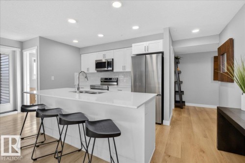 125 1506 Tamarack Boulevard, Edmonton, AB - Indoor Photo Showing Kitchen With Double Sink With Upgraded Kitchen
