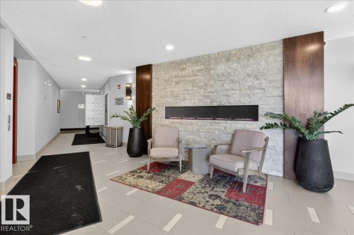 125 1506 Tamarack Boulevard, Edmonton, AB - Indoor With Fireplace