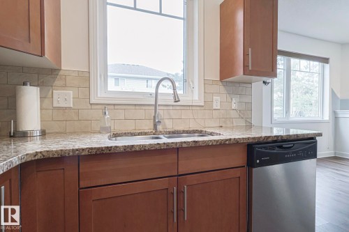 111 2035 Grantham Crest Nw, Edmonton, AB - Indoor Photo Showing Kitchen With Double Sink
