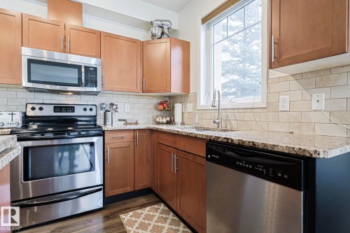 111 2035 Grantham Crest Nw, Edmonton, AB - Indoor Photo Showing Kitchen With Stainless Steel Kitchen