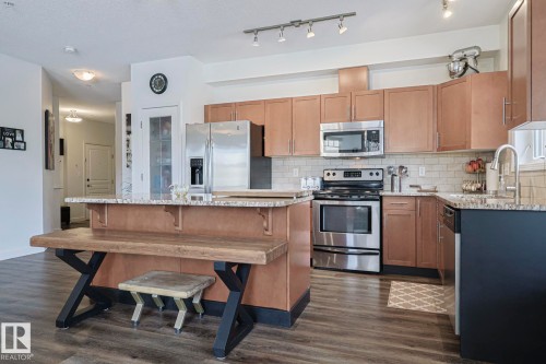 111 2035 Grantham Crest Nw, Edmonton, AB - Indoor Photo Showing Kitchen With Stainless Steel Kitchen With Double Sink With Upgraded Kitchen