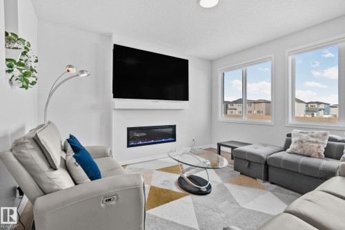 15816 29 Avenue, Edmonton, AB - Indoor Photo Showing Living Room With Fireplace
