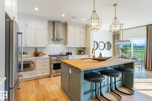 18 Emerald Way, Spruce Grove, AB - Indoor Photo Showing Kitchen With Stainless Steel Kitchen With Upgraded Kitchen