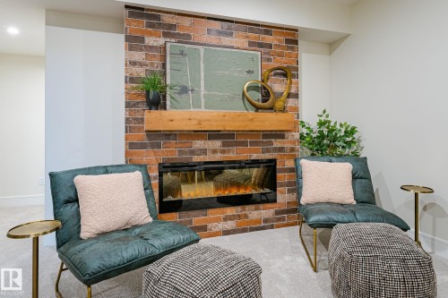 18 Emerald Way, Spruce Grove, AB - Indoor Photo Showing Living Room With Fireplace