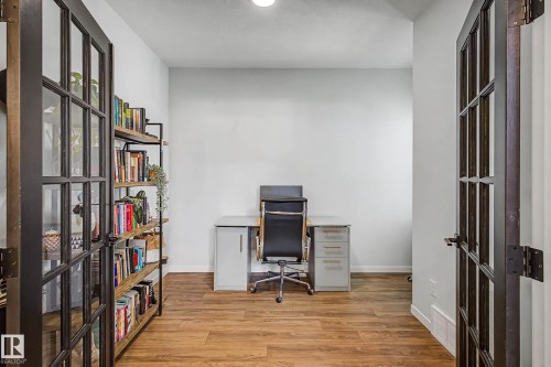 Home office with light wood-type flooring and french doors - 34 Riverhill Crescent, St. Albert, AB - Indoor Photo Showing Office