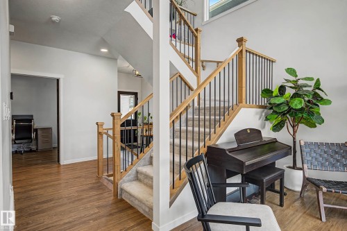 Stairway featuring wood finished floors and recessed lighting - 34 Riverhill Crescent, St. Albert, AB - Indoor Photo Showing Other Room